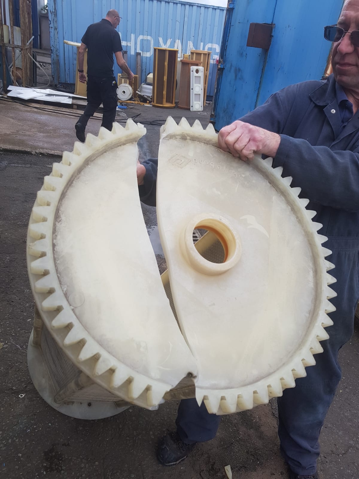 Broken polypropylene barrel end plate — cracked under normal production loads